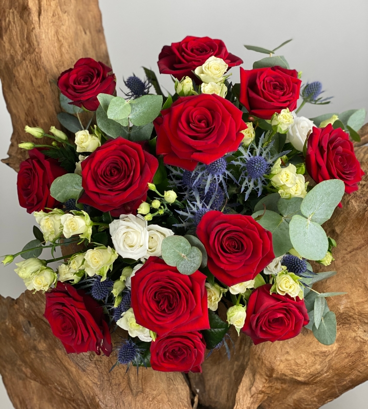 Red Sea red and white rose bouquet with thistle and eucalyptus