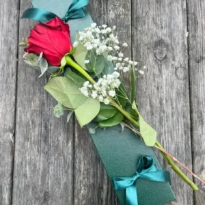 Single red rose box displayed as a classic red roses gift arrangement